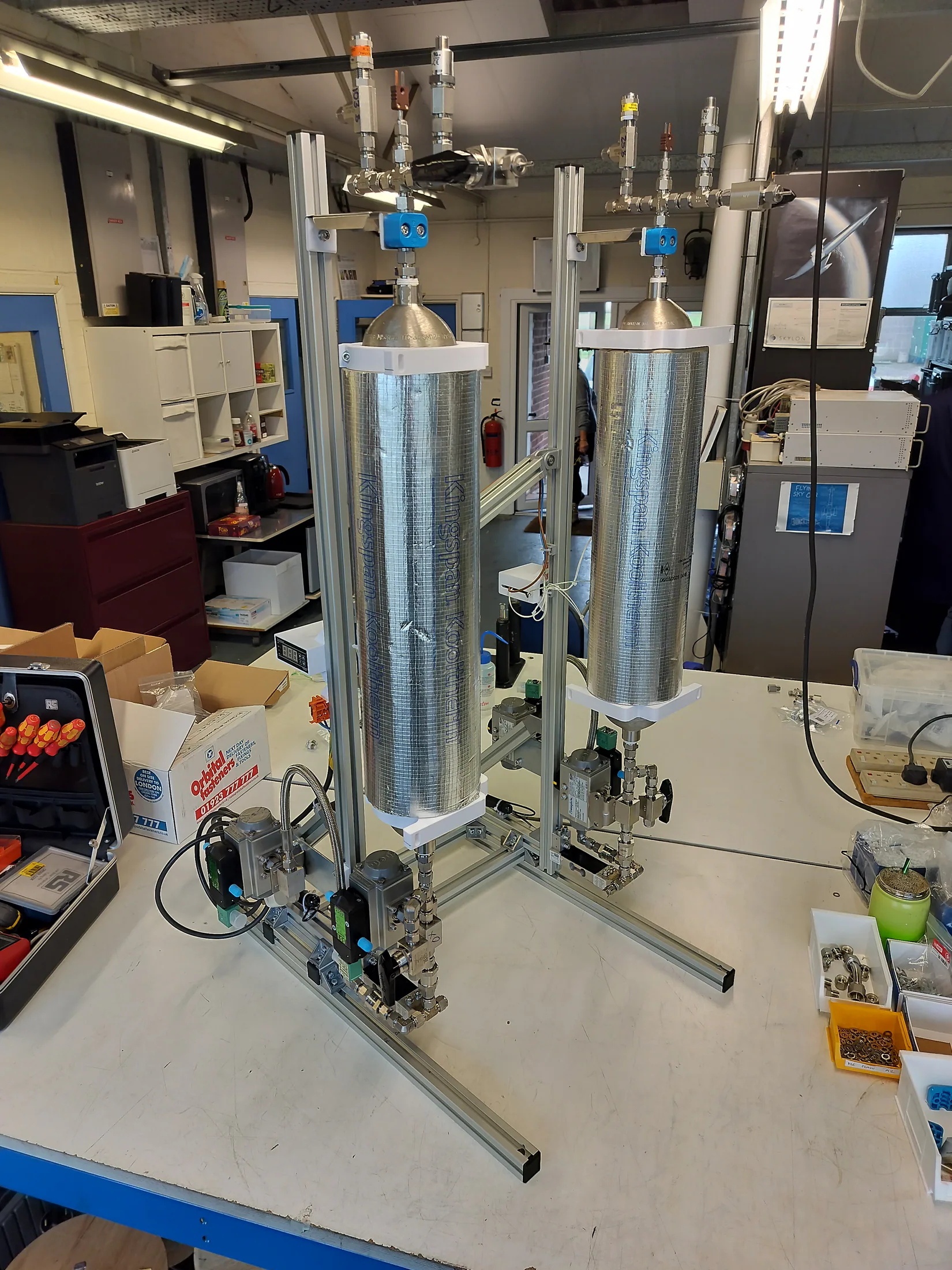 Completed self-pressurizing rocket engine test rig with twin insulated vessels.